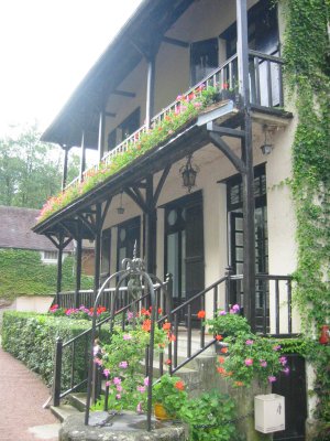 Old Mill Inn, Flower and Vine Encased.